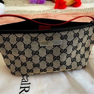 Gucci GG Canvas Boat Pochette